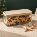 Crescent-cut U.S.-grown Hawaiian sandalwood curls in a rectangular glass canister