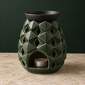 Faceted forest-green ceramic tea-light warmer with removable charcoal dish